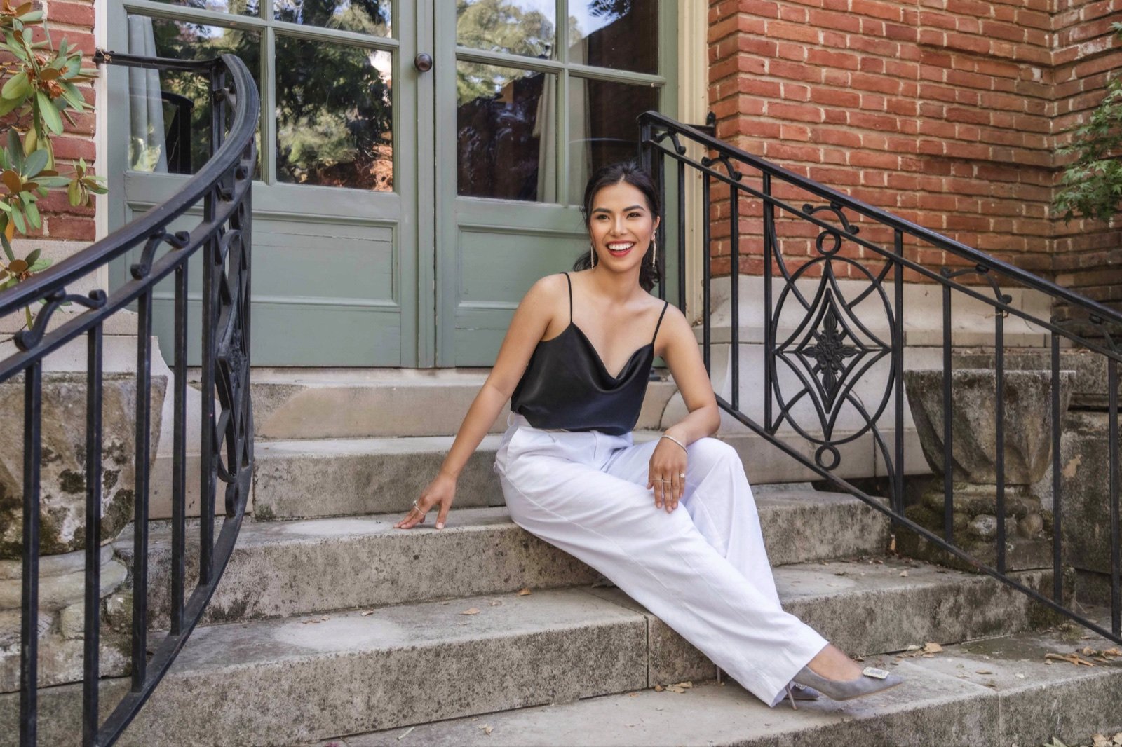 Dorothy sitting on brick steps