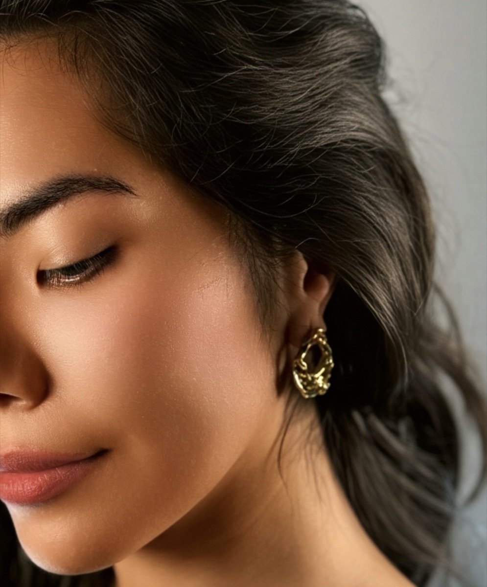 Sylvia earrings in gold, worn