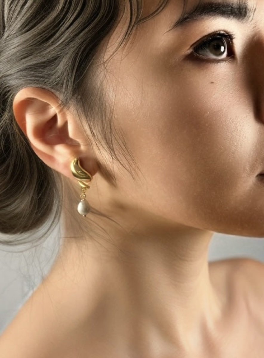 Serena earrings, worn